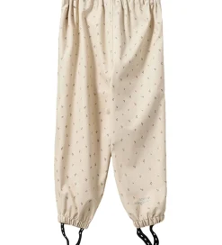 Regntøj|Sofie Schnoor Regntøj - PU - Varask - Sand m. Blomster